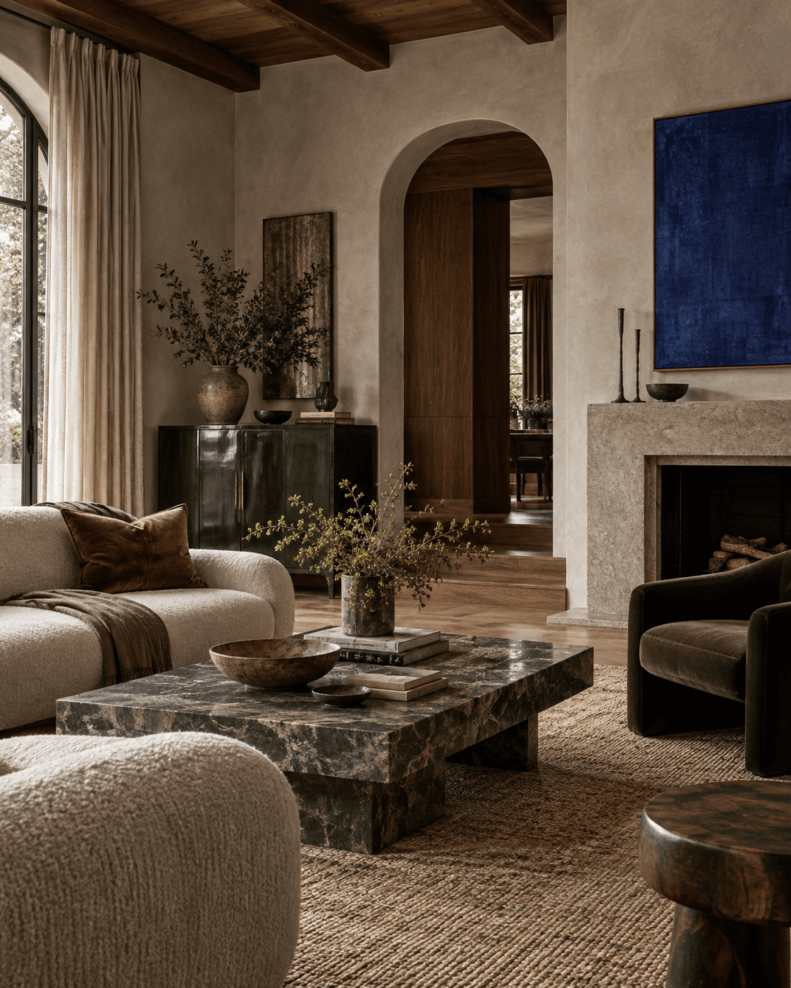 Conceptual material-rich room with a bottle-green cabinet and ultramarine artwork.
