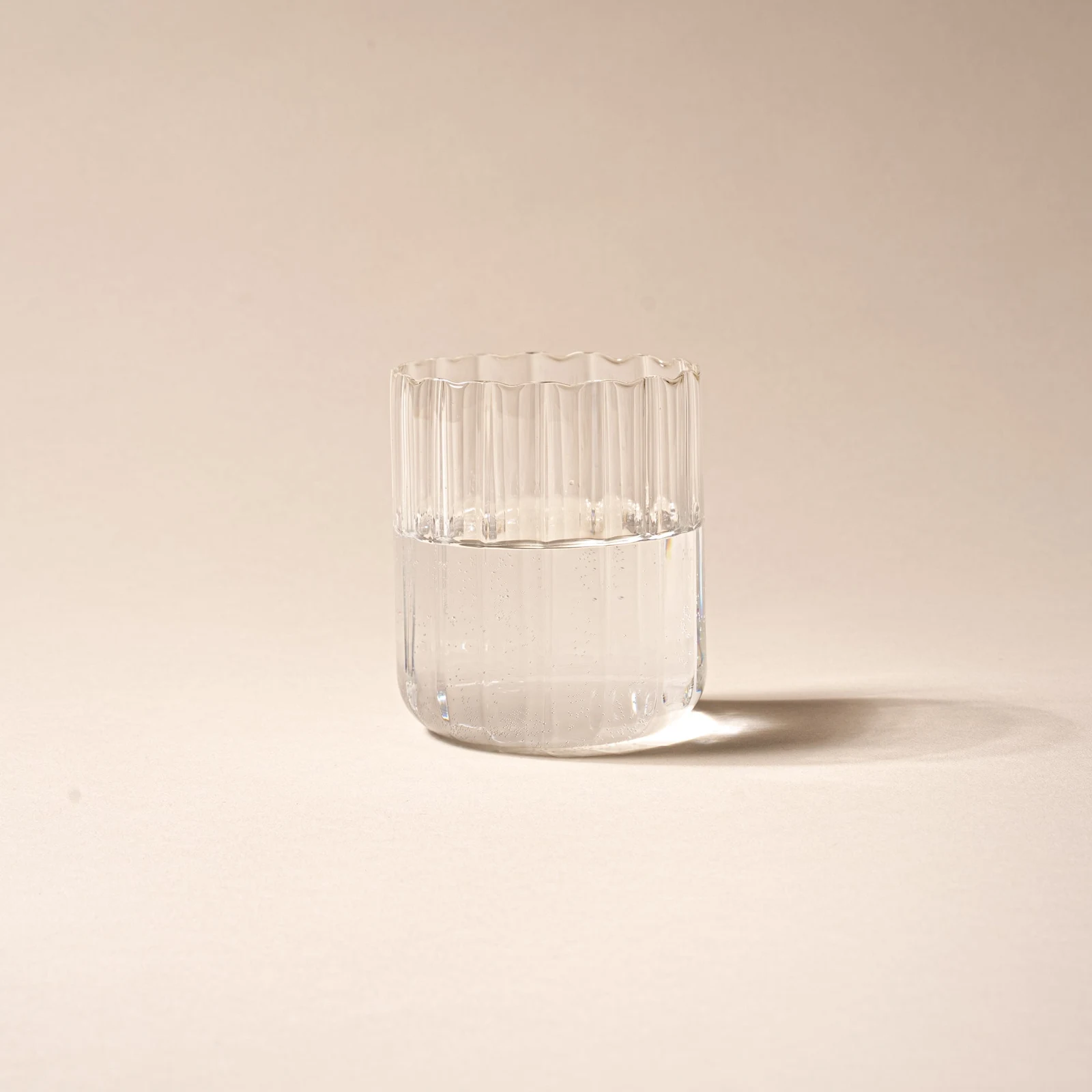 Fluted Tumbler by Hayden Wilson Glass LLC.