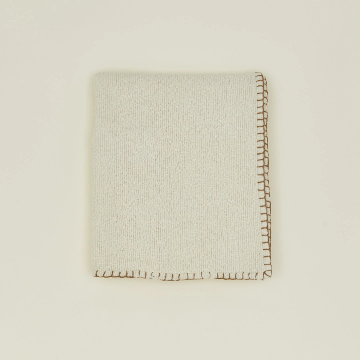 Blanket Stitch Boucle Throw by Indaba Trading.