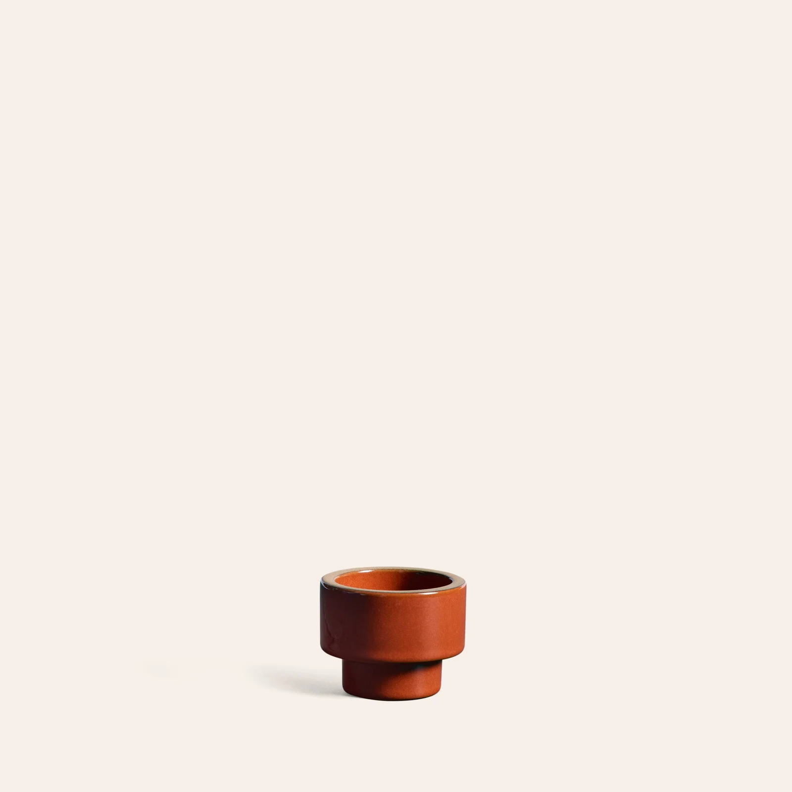 Candle Holder in Burnt Red by Heath Ceramics.