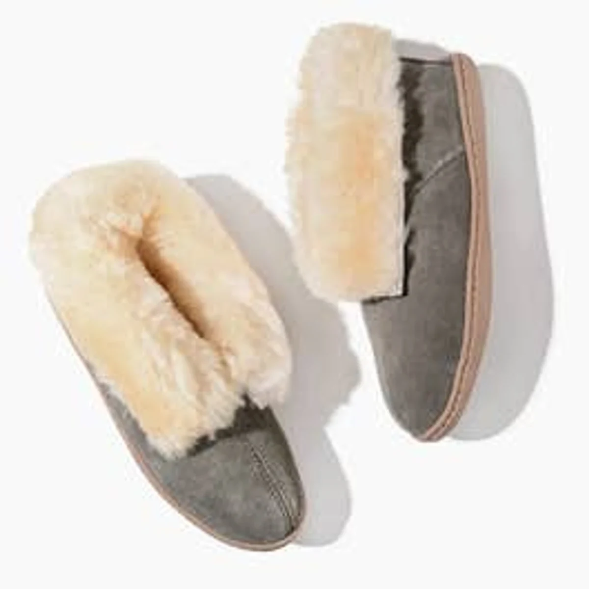 Women's Sheepskin Ankle Boot by Minnetonka.